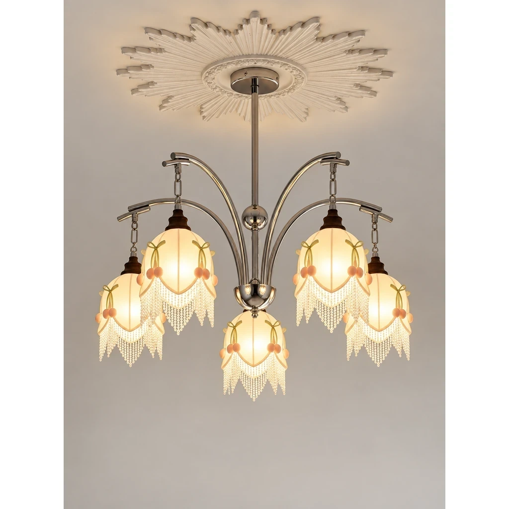 Lucia branching floral fabric chandelier switched on in a neutral studio