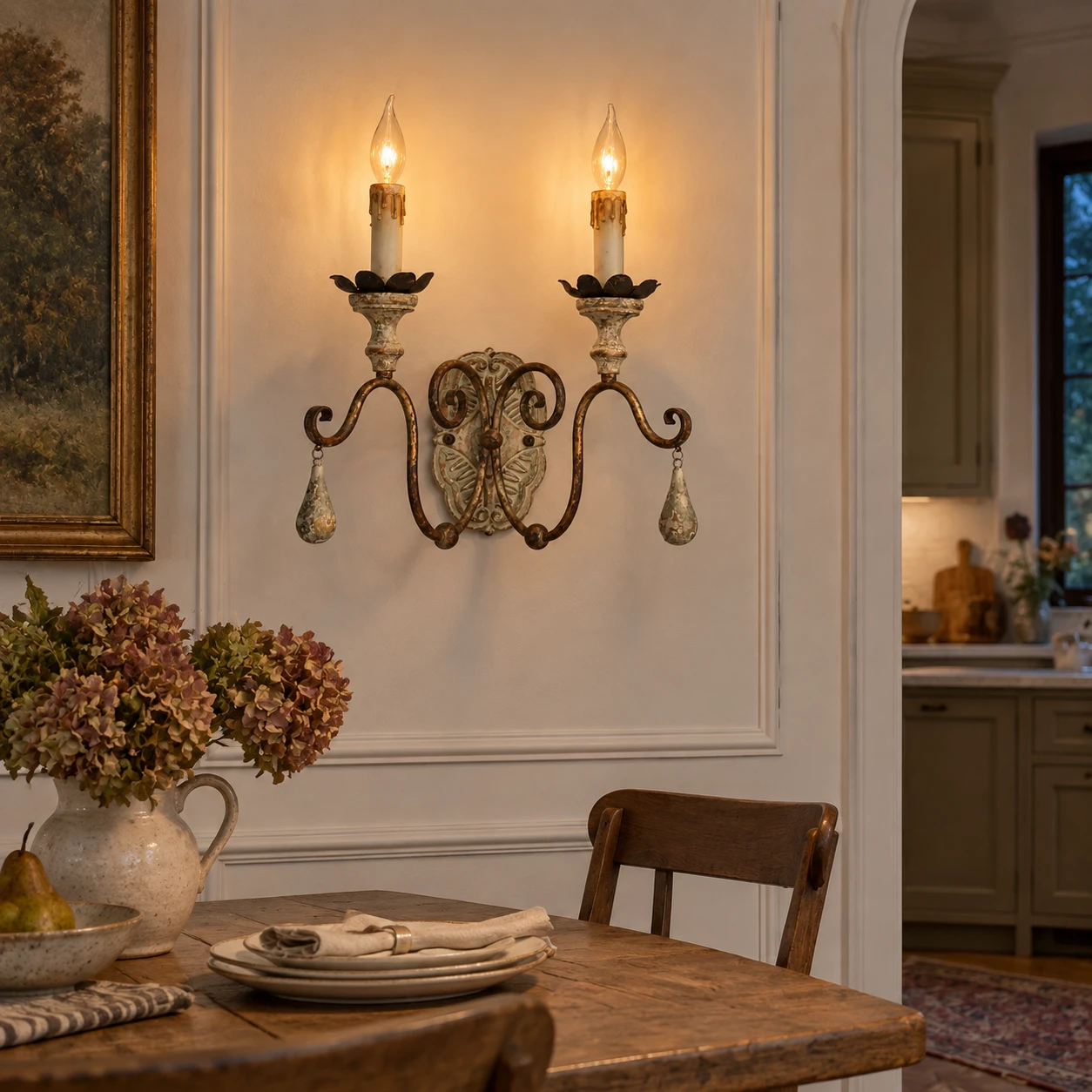 Two-light wood and iron wall sconce installed above a console