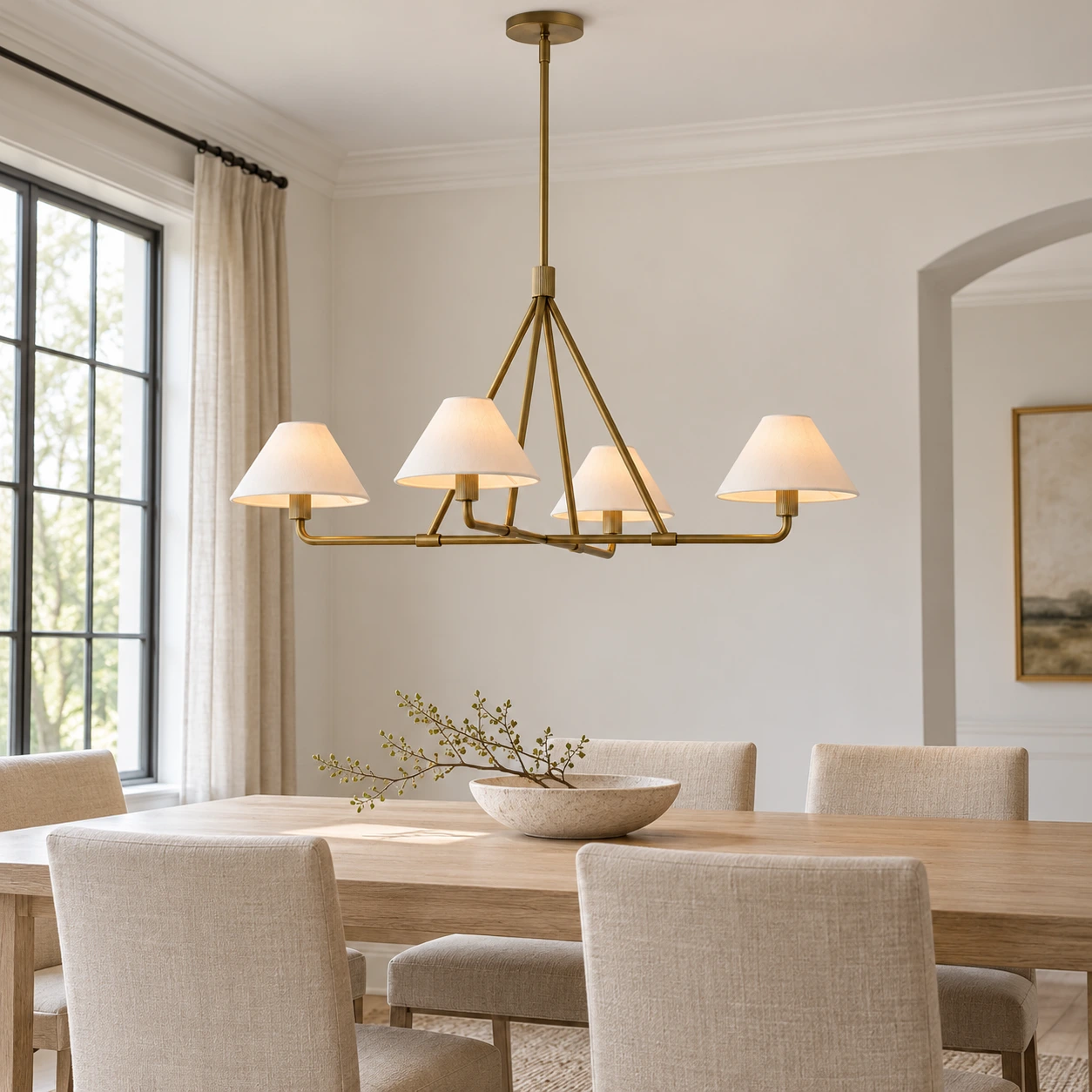 4-Light Gold linear chandelier over a dining table