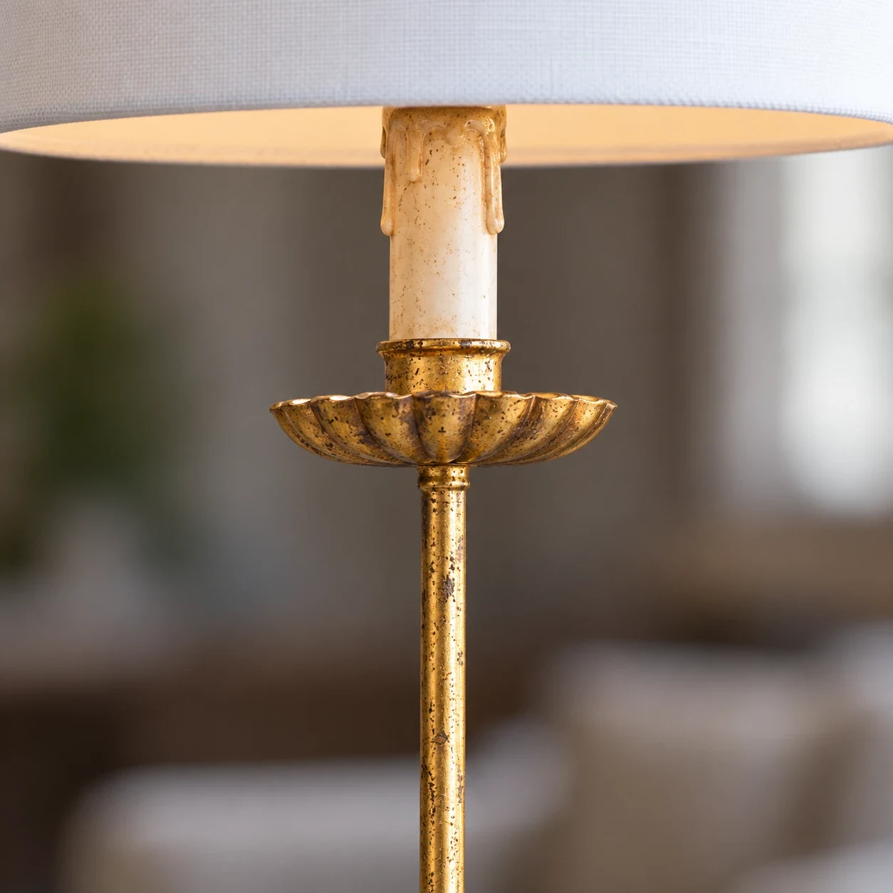 Close view of the candle cup and slim stem on the Clove table lamp