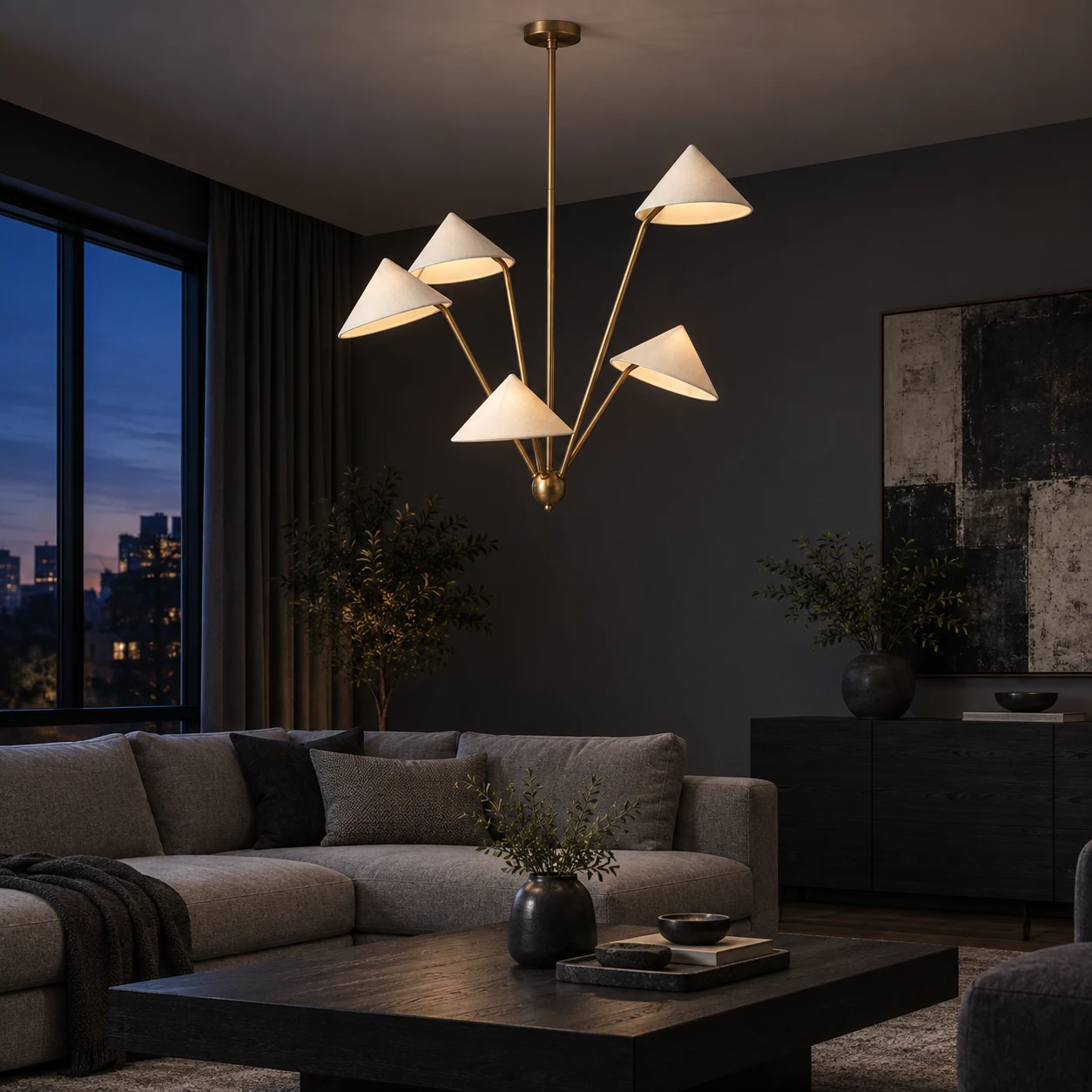 Suspension lumineuse dans un salon aux tons anthracite au crépuscule