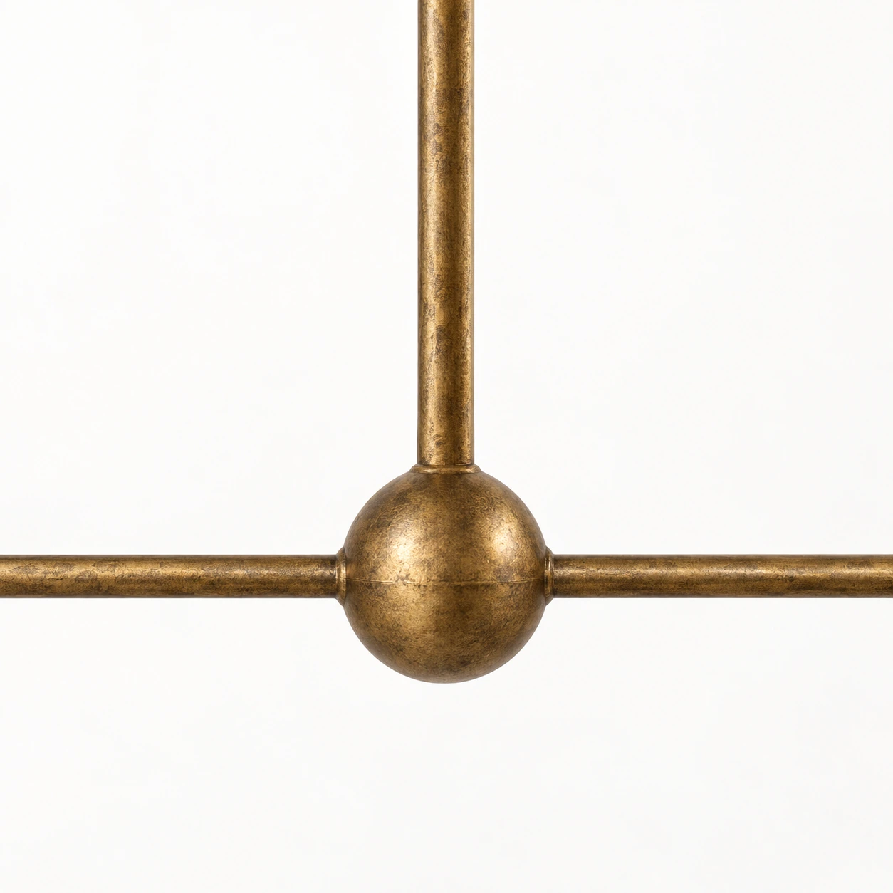 Close detail of the vintage gold central metal joint and arms