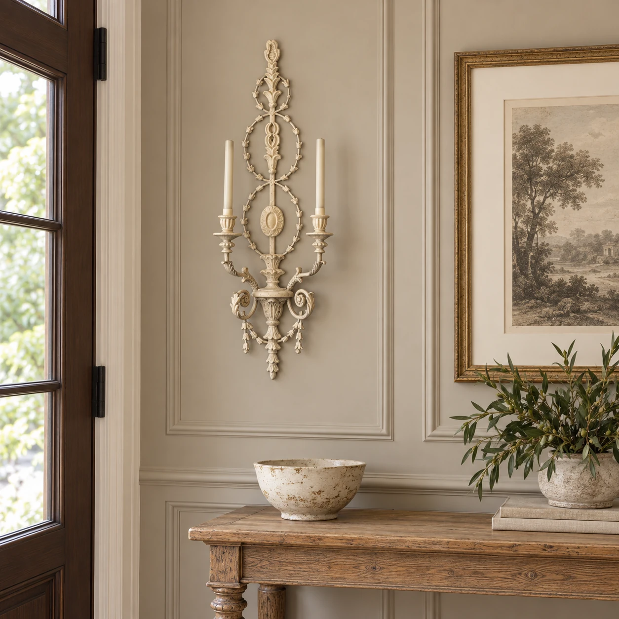 Maren carved wood wall sconce installed in an entryway