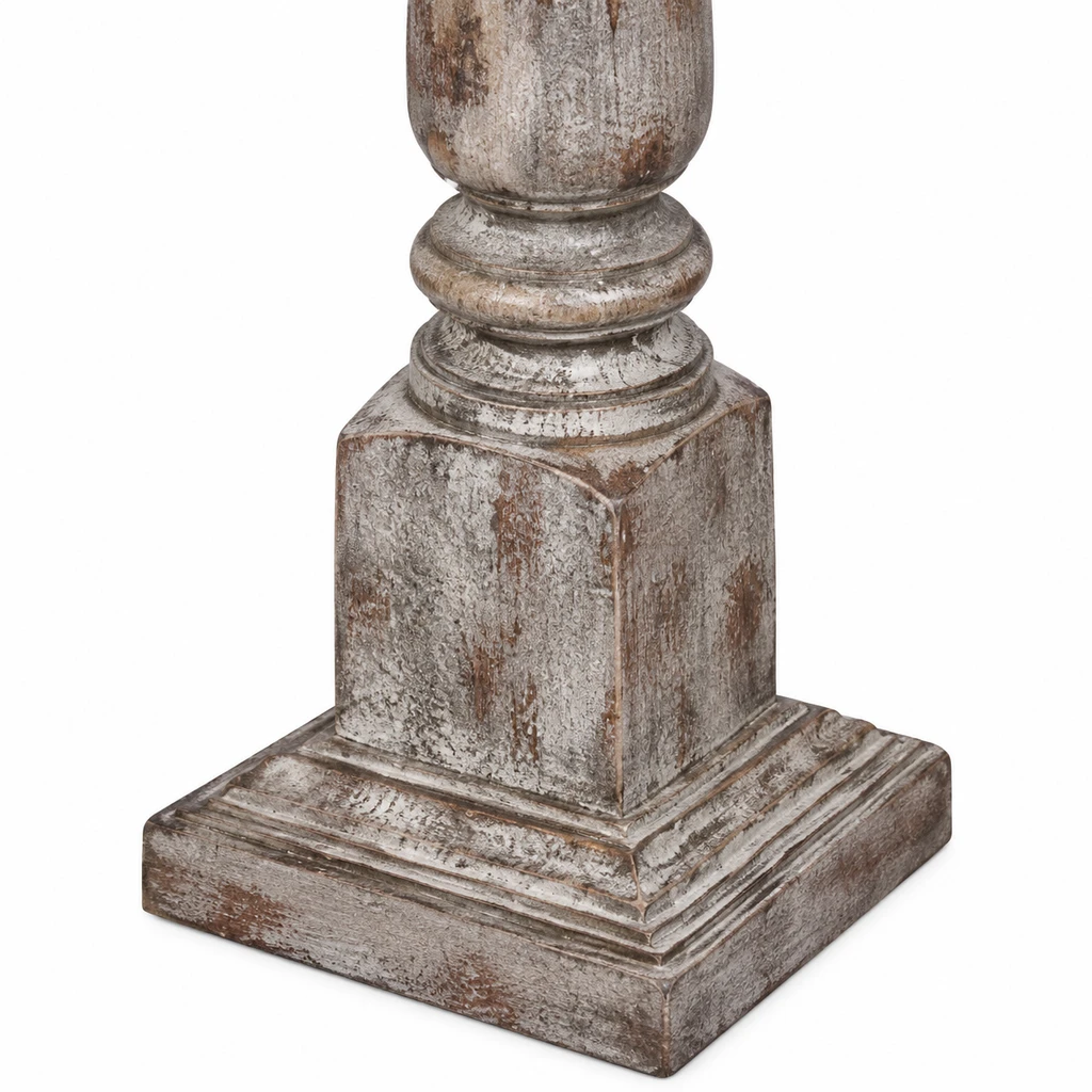 Close detail of the square distressed wood base
